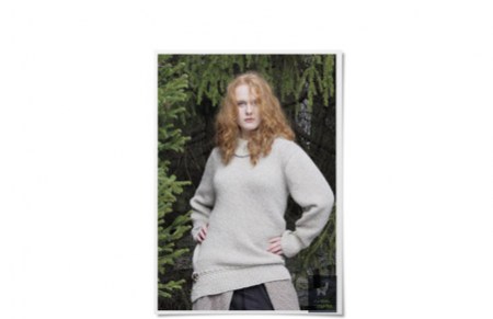 Sweater med fletmønster ved kanterne